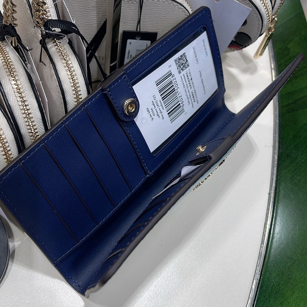 Kate Spade Madison Large Slim Bifold Wallet
Blue Glow 
NWT - Picture 6 of 16